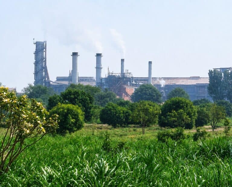 Sugar mill beyond green fields – irrigation water treatment, Pakistan