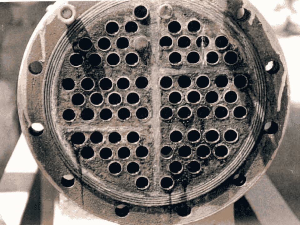 Heat exchanger after HydroFLOW — scale cleared, tubes open and flowing