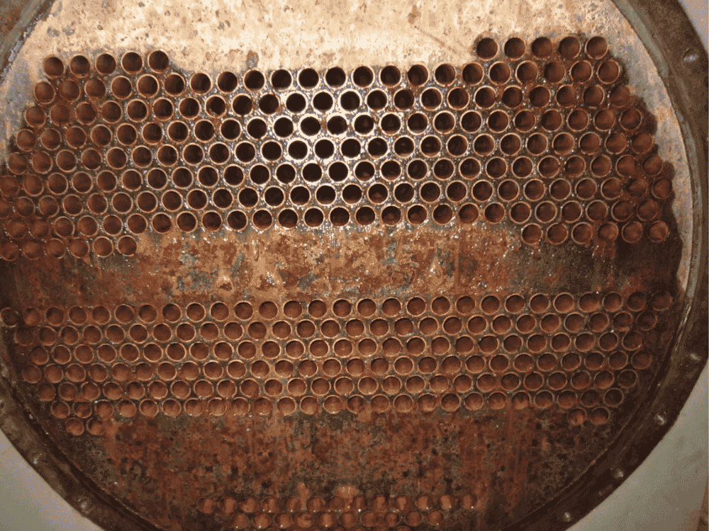 Link REIT cooling tower condenser after HydroFLOW — clean, scale-free tubes