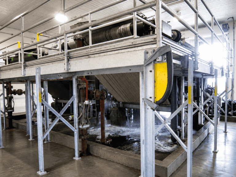 Belt filter press at the City of Walla Walla wastewater treatment plant, HydroFLOW struvite scale prevention case study