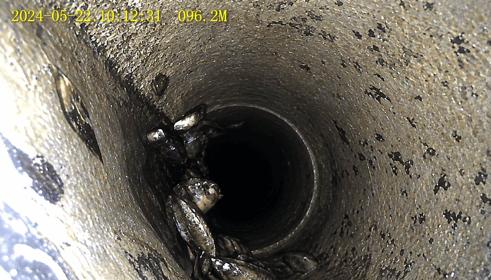 The same seawater line after HydroFLOW — clear pipe bore on camera inspection