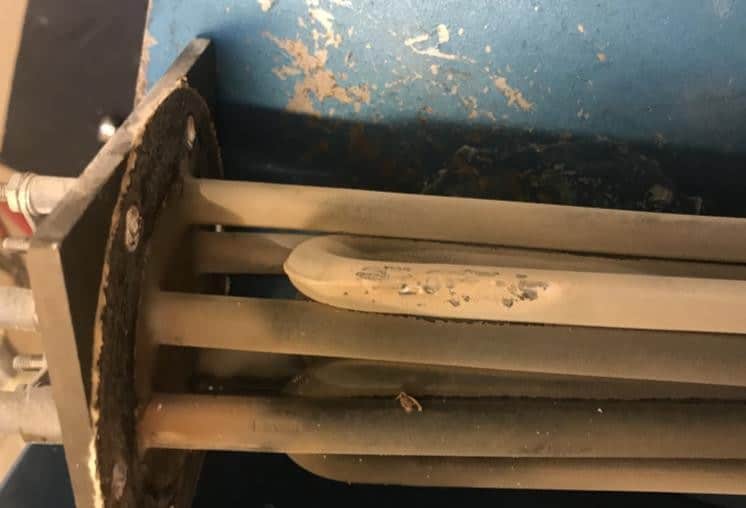 The same steam boiler heating elements after 60 days with HydroFLOW, hard scale gone